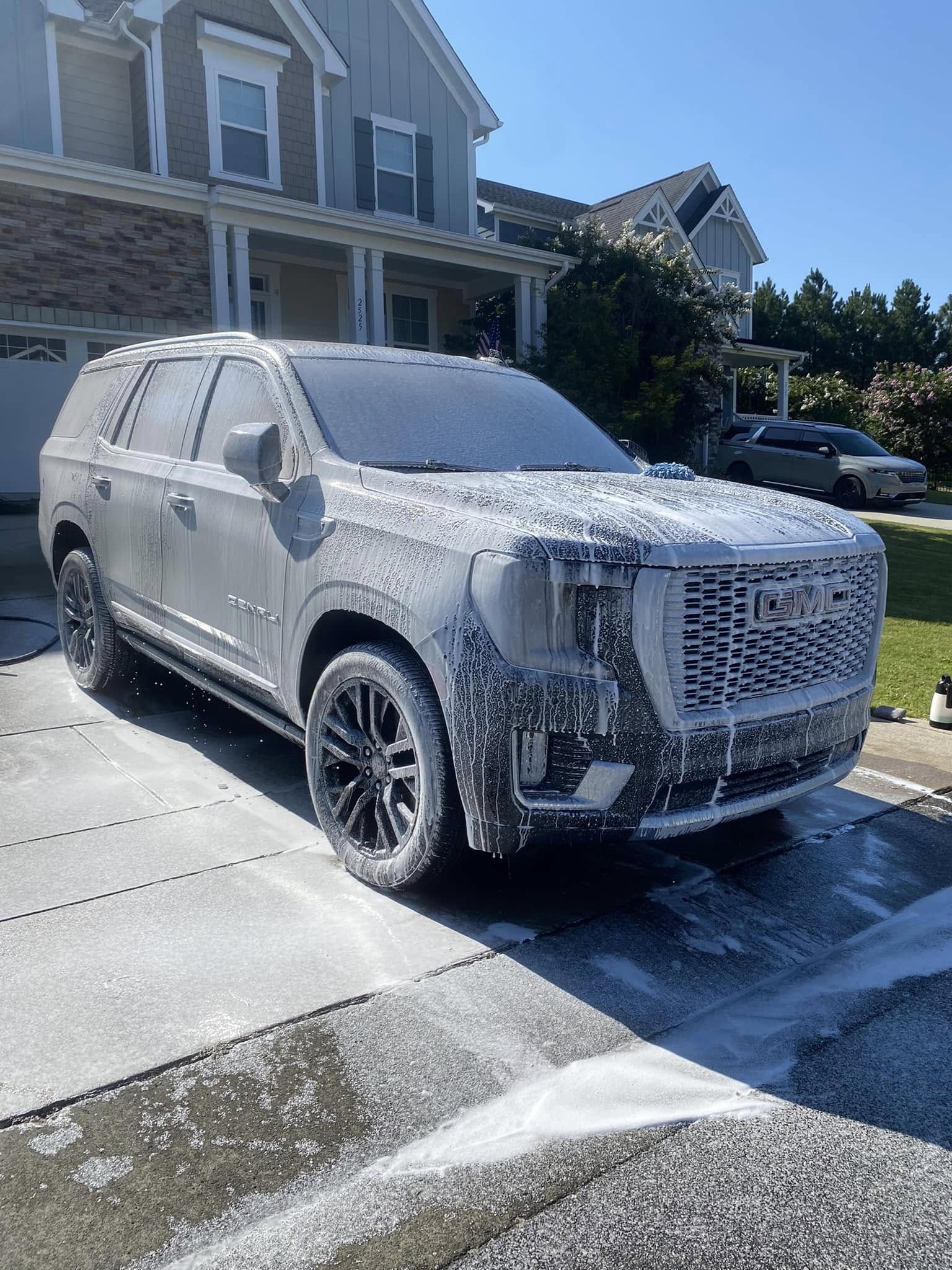 GMC Yukon Denali during a foam wash